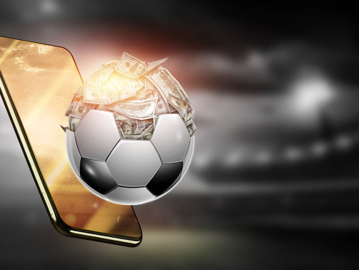 Dollars are inside the soccer ball, the ball is full of money. Sports betting, soccer betting, gambling, bookmaker, big win